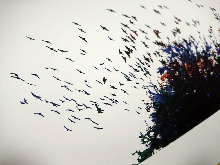 An artwork depicting a flock of birds encircling a tree